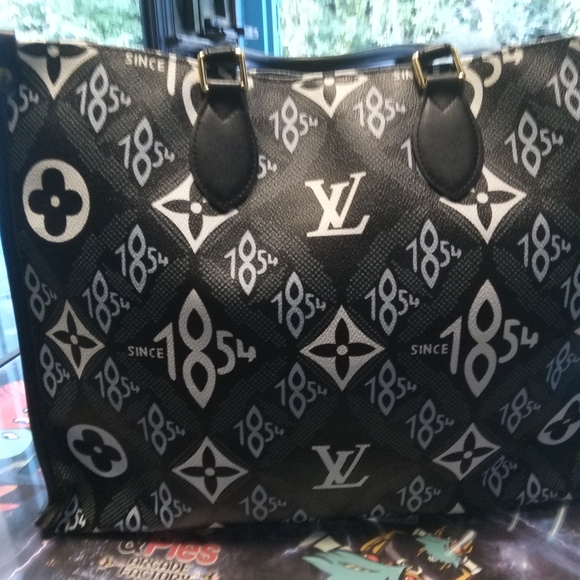 Louis Vuitton Black and Gray Patterned Tote - Picture 1 of 3
